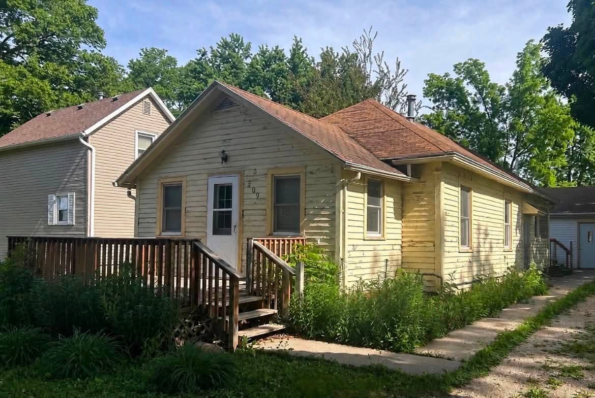 Before photo of a Robertson Roofing and Siding exterior project